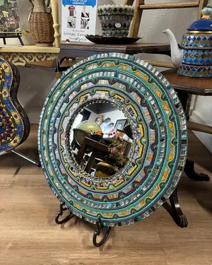 Miroir rond au cadre en mosaïque