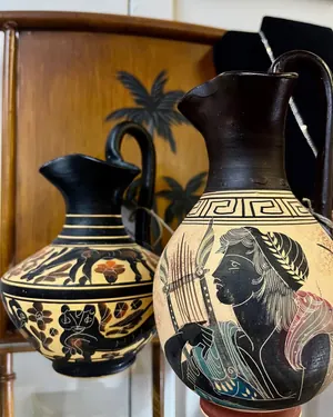 Greek-style painted pitchers and vase
