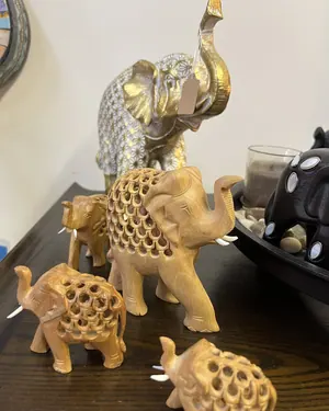 Carved wooden elephants in three sizes