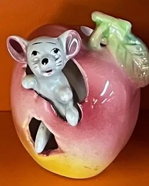 Ceramic mouse-and-apple money box
