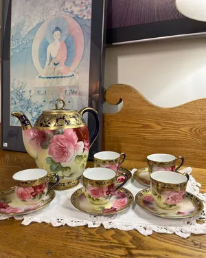 Rose-patterned porcelain tea service