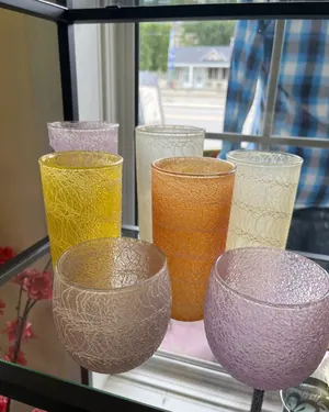 Pastel spun-glass vases in a window