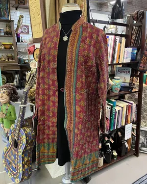 Patterned vintage duster on a mannequin