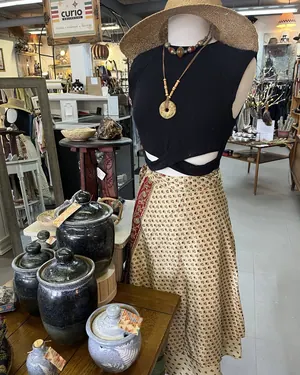 Black top and patterned midi skirt